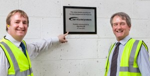 Owen Paterson and Nigel Mills MP with a plaque of BPI Recycled Product's line, opened by Nigel Mills MP