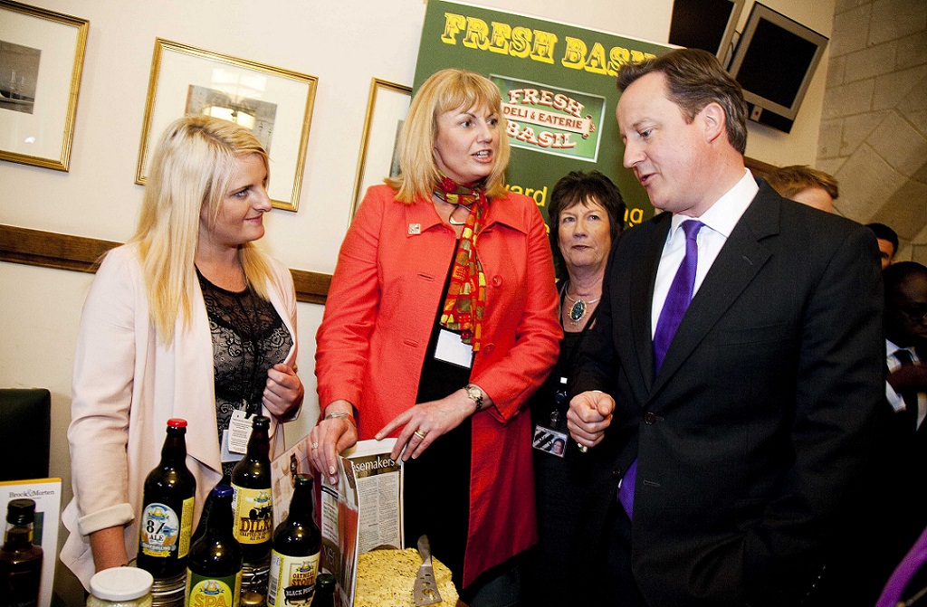 Prime Minister David Cameron pictured with Wendy Moore of Fresh Basil, Belper