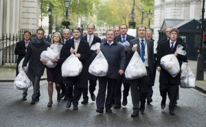 Pictured alongside fellow supporters of the petition walking down Downing Street to hand in the signatures of supporters.